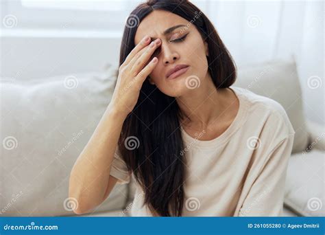 Woman Sitting on Sofa at Home Pain in Nose and Throat, Cold and Allergy, Covid-19 Disease ...