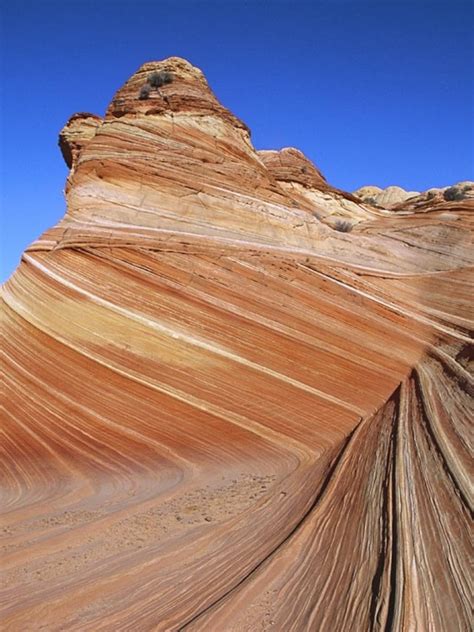 Wind Blasting Sand at Rock and Carving Out Arches