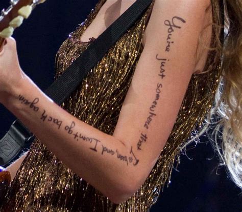 Why Does Taylor Swift Draw Lyrics and Symbols On Her Arm? : r/TaylorSwift