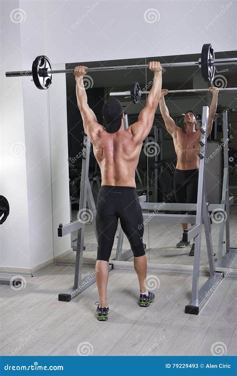 Handsome Powerful Athletic Man Doing Barbell Shoulder Press Exercise ...