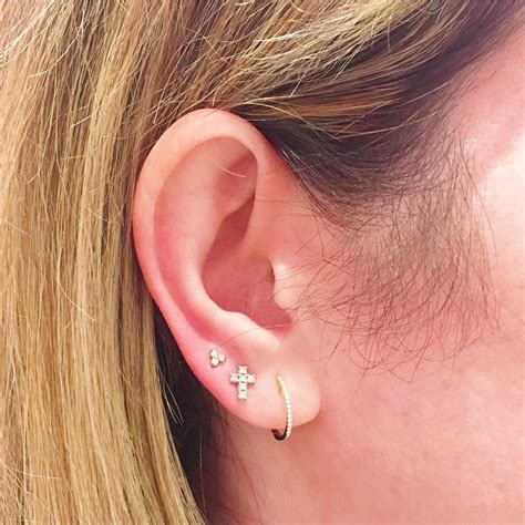 Fresh third lobe piercings done by @piercedbyfae over at our square one ...