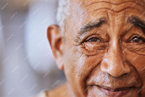 Premium Photo | Portrait of a happy kind black senior mans face with wrinkles smile and friendly ...
