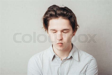 Man sucking in his cheeks | Stock image | Colourbox