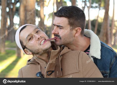 Couple Kissing Man Biting Long Tongue Stock Photo by ©albejor2002 ...
