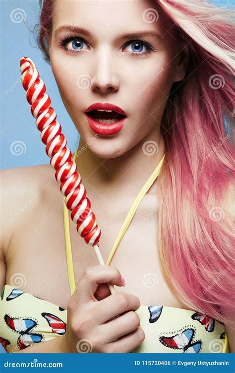 Beautiful Woman with Lollipop Stock Photo - Image of blue, female ...