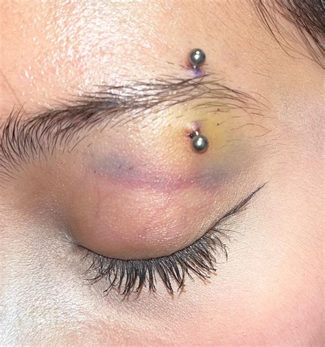 is my eyebrow piercing infected/rejecting? : r/PiercingAdvice