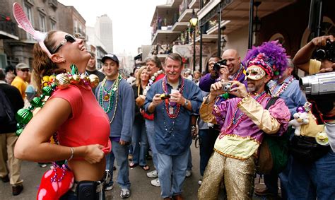 Stripping off inhibitions in the 'free market' of Mardi Gras | PBS NewsHour