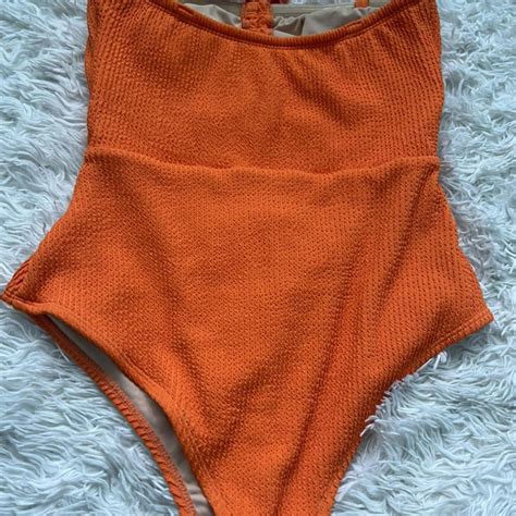 Orange one piece swimming suit - Depop