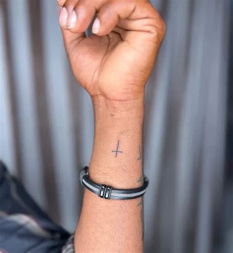 46 Faithful Cross Tattoos on Wrist To Get In 2026