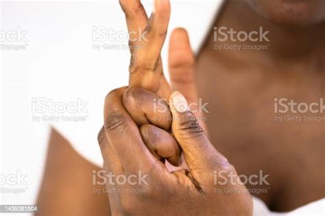 Hand Knuckle Finger Joint Crack Stock Photo - Download Image Now ...