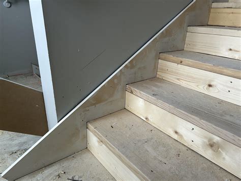 How to Cut Staircase Skirt Board: Easy Steps for Perfect Fit - buzzlyo