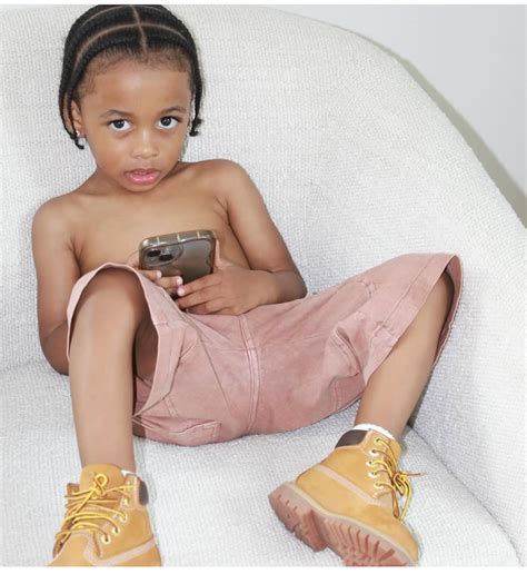 Cardi B Debuts Daughter Blossom in a Pink and Tan Louis Vuitton X ...