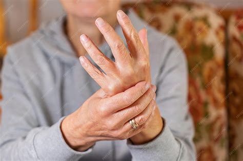 Premium Photo | Senior woman suffering from hand and finger joint pain ...