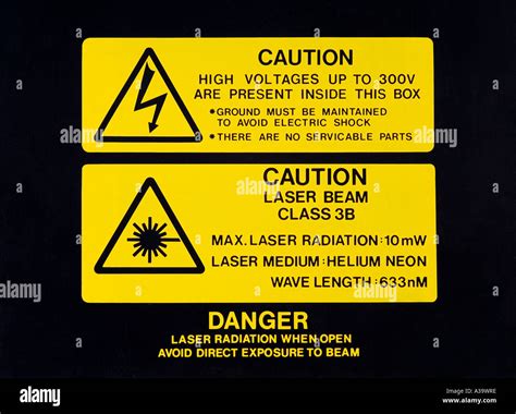 class 3B laser radiation and high voltage warning labels Stock Photo ...