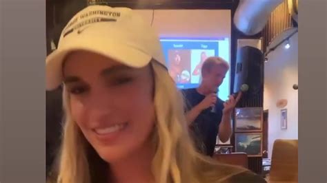 Kayla Simmons gives fans an eyeful in low-cut top as world's sexiest volleyball star bounces ...