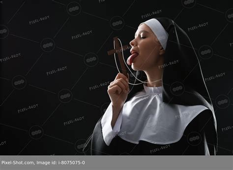 Slutty nun with cross on dark background :: Stock Photography Agency ...