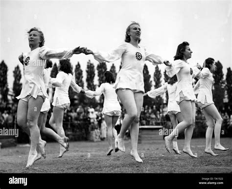 Women do different exercises in a sports competition of the Nazi ...