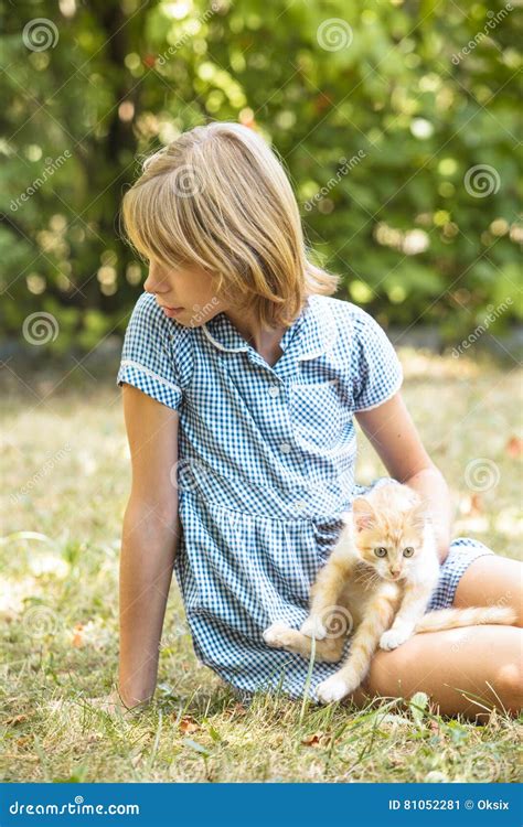 Girl play with kitten stock image. Image of green, play - 81052281