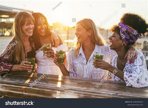 Happy Girls Having Fun Drinking Cocktails Stock Photo 2285283913 | Shutterstock