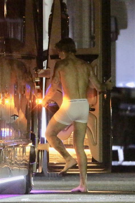 Justin Bieber runs around downtown LA in just his Calvin Klein ...