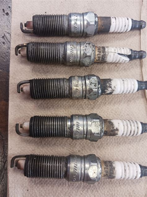 What would cause spark plugs to become like this? - Maintenance/Repairs - Car Talk Community