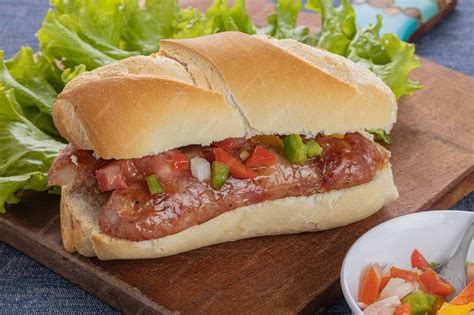 Premium Photo | Choripan typical argentine sandwich with chorizo and ...