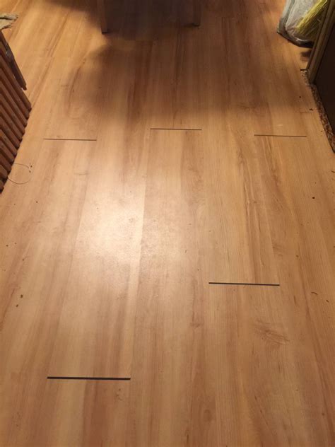 Chipped Laminate Flooring Repair - Electrical Panel Repair