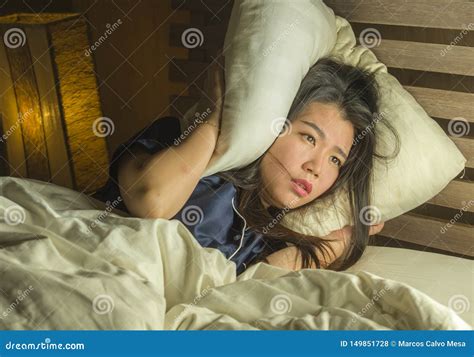 Beautiful Sad and Depressed Asian Chinese Woman Awake in Bed Late Night Suffering Anxiety Crisis ...