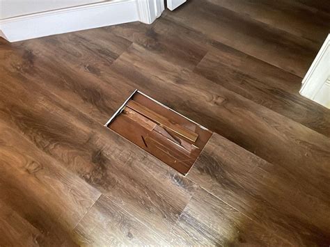 Buckling Associated with Non-Permeable Flooring Installed Over Wood ...