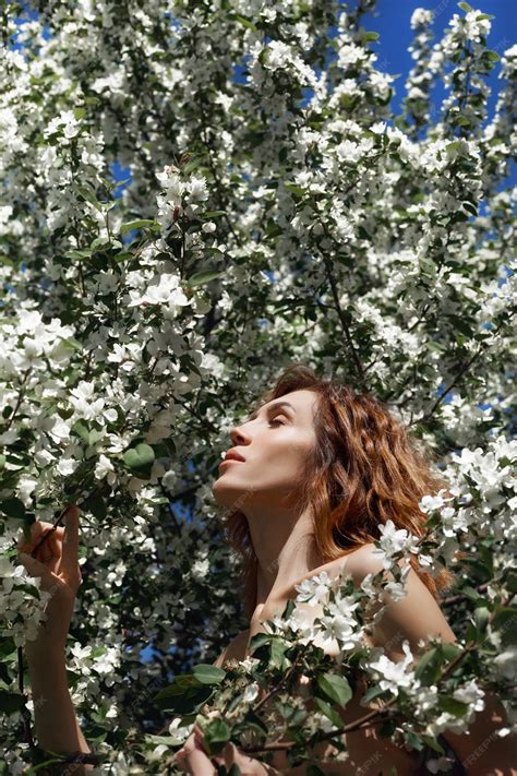 Premium Photo | Beautiful nude art woman in branches and foliage