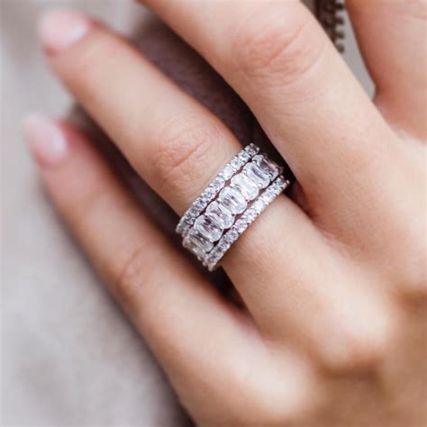 Love this stacking style of pairing dainty eternity bands with our ...
