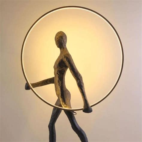 ALPHA Standing Man Holding LED Circle Light | Elegant Interior