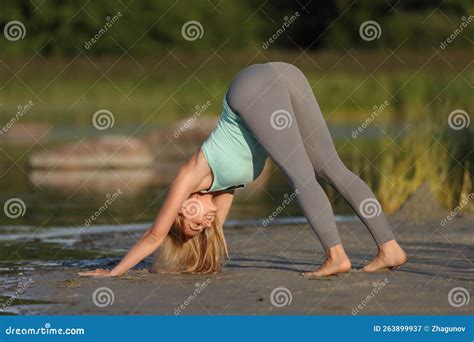 Young Naked Woman Practices Yoga on the Beach Stock Image - Image of ...