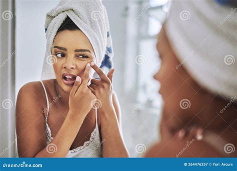 This Pimple is Such a Pain. an Attractive Young Woman Squeezing a ...