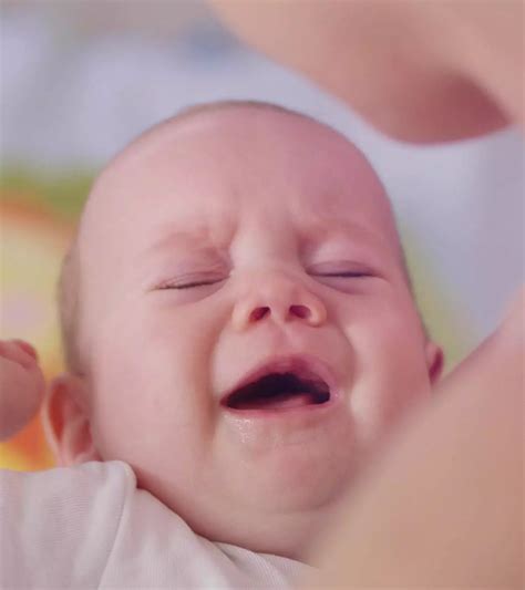 Baby Crying While Breastfeeding: 20 Causes & Soothing Tips