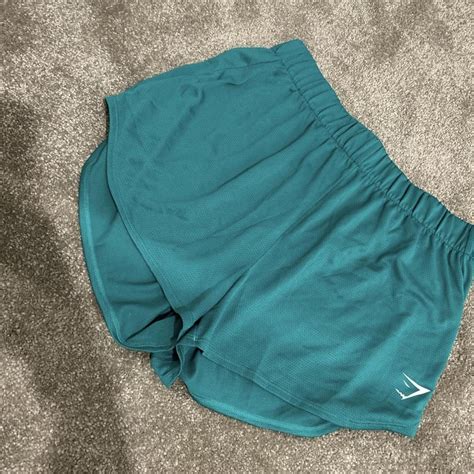 Gymshark green running shorts Size small #gymshark... - Depop