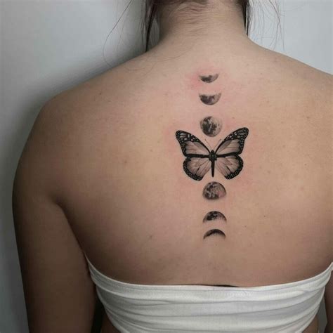Moon Phases Spine Tattoo