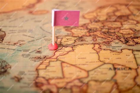 Premium Photo | The flag of morocco on the world map