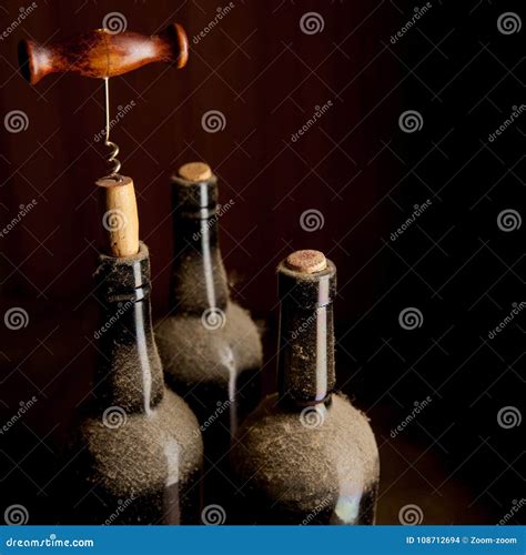 Three Old Wine Bottles and Corkscrew Stock Photo - Image of glass ...