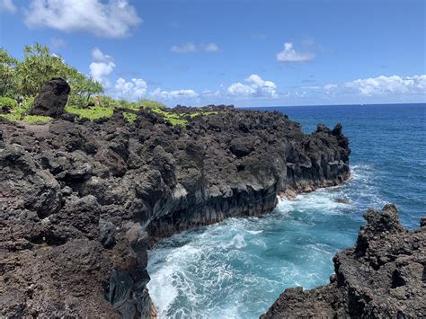 Our first time in Maui and stopped at the Black Sand Beach on the Road to Hana | Scrolller