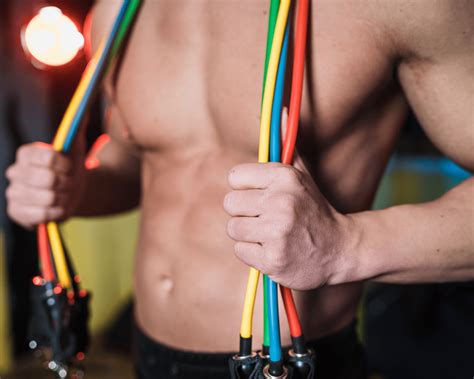 7 Best Resistance Band Tricep Exercises To Grow All Three Heads!