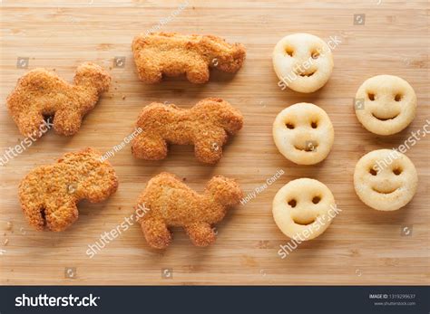 Dinosaur Chicken Nuggets And Smiley Fries