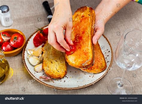 Female Hands Rubbing Crispy Golden Toast Stock Photo 2493041683 ...