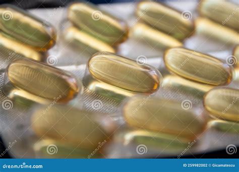 Multiple Yellow Fish Oil, Omega 3, Vitamin D Capsules Stock Photo ...