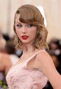 Taylor Swift's Signature Bangs Signify Their Own Eras