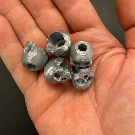 3d printed skulls for lanyards and zipper pulls - Kruger EDC