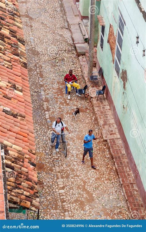 Typical Cobblestone Street with Colonial Buildings in Trinidad, Sancti ...