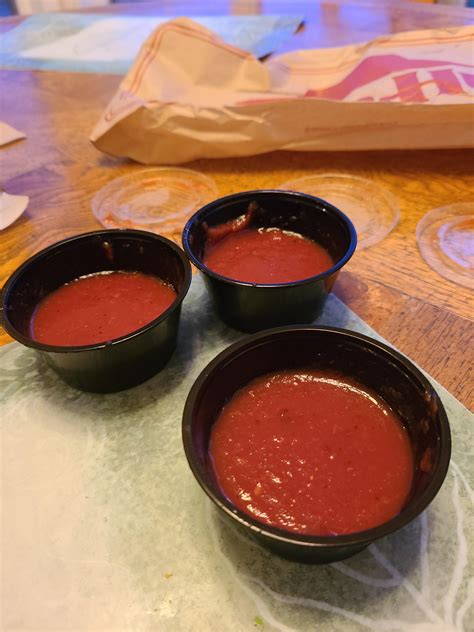 At $0.99 each for extra sauce, why only half full? : r/pizzahut