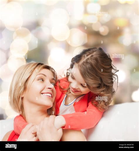 hugging mother and daughter Stock Photo - Alamy