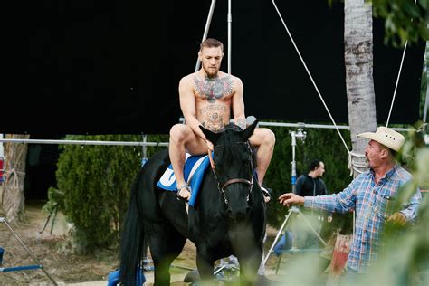 Conor McGregor strips off as he takes a horse ride in shock new video ...